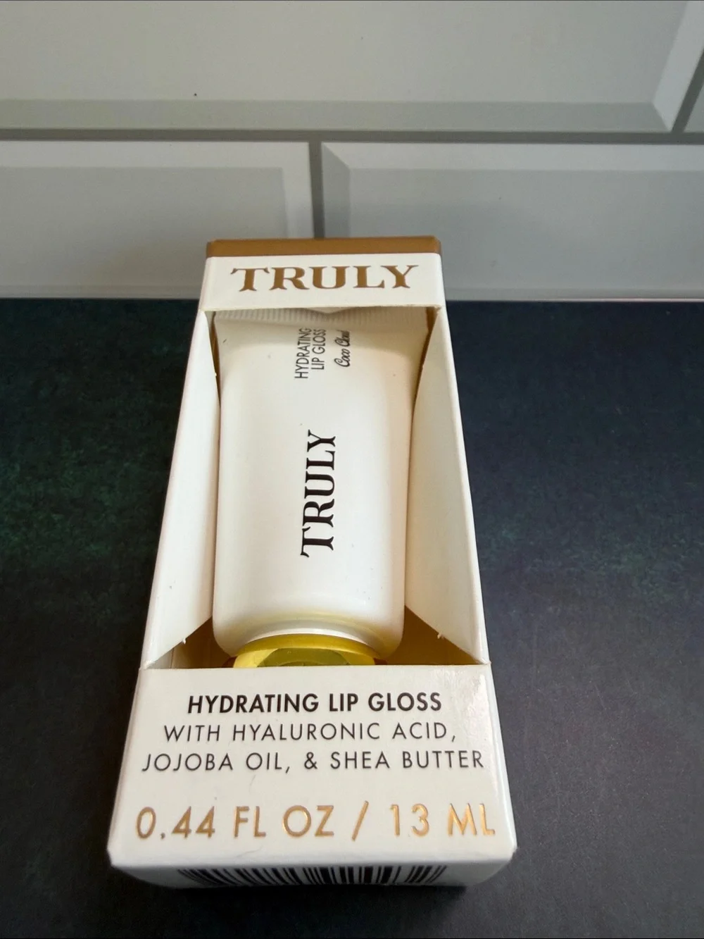 TRULY Hydrating Lip Gloss — White & Gold Packaging